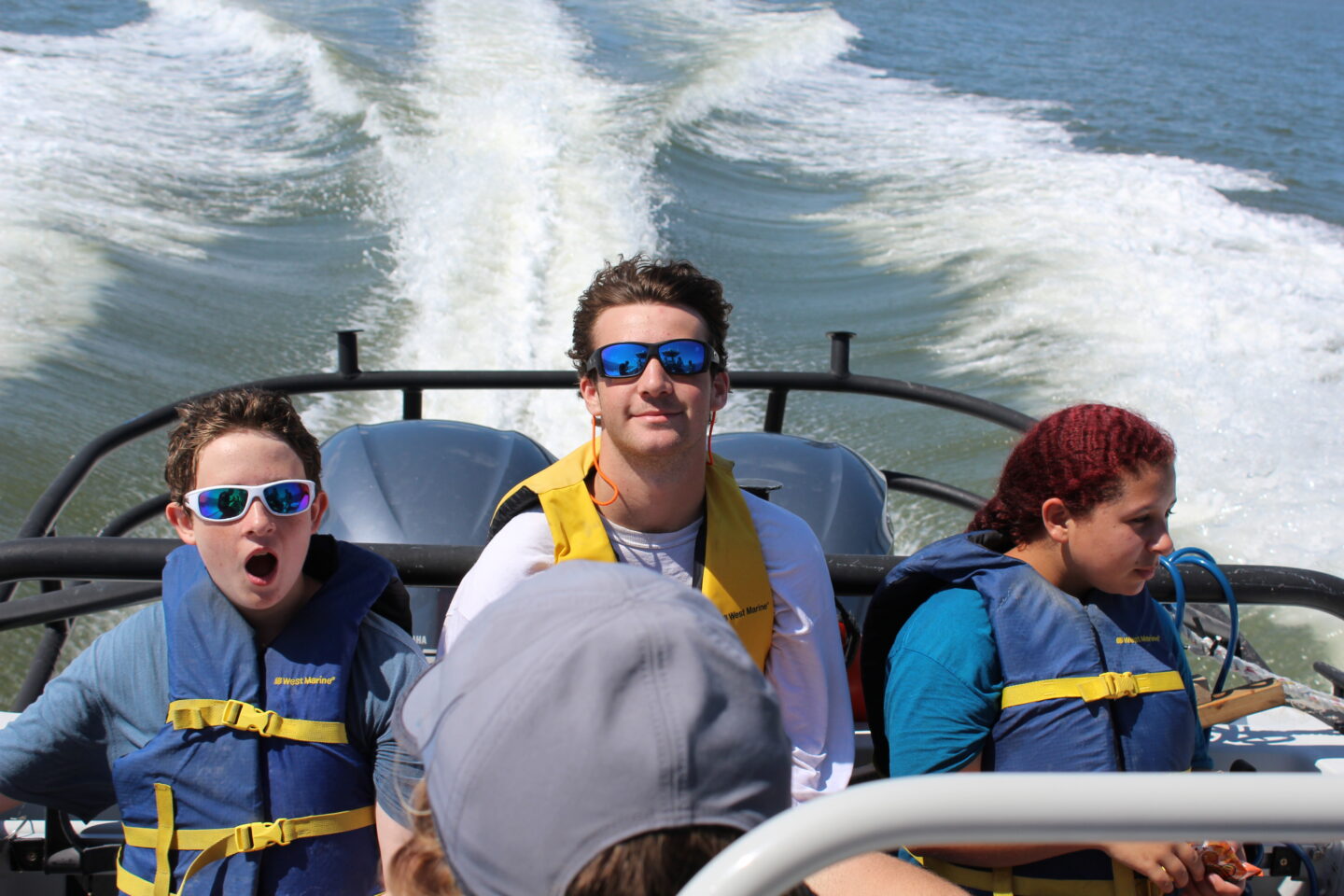 Students in a speed boat