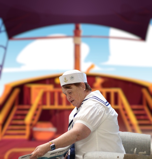Shows a woman in a sailor's outfit reading a book with a cartoon boat deck in the background.