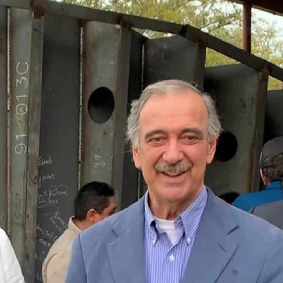 Profile photo of Paul Sammarco, smiling directly at the camera in a gray suit.